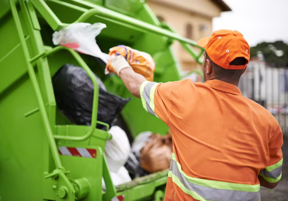 one-mans-trash-cropped-shot-garbage-collection-worker_590464-10914 (1)